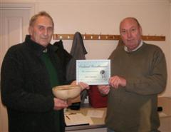 The monthly Highly commended Nick Adamek received his certificate from Peter Blake